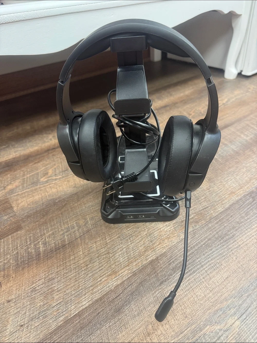 Black Over-Ear Headphones on Stand